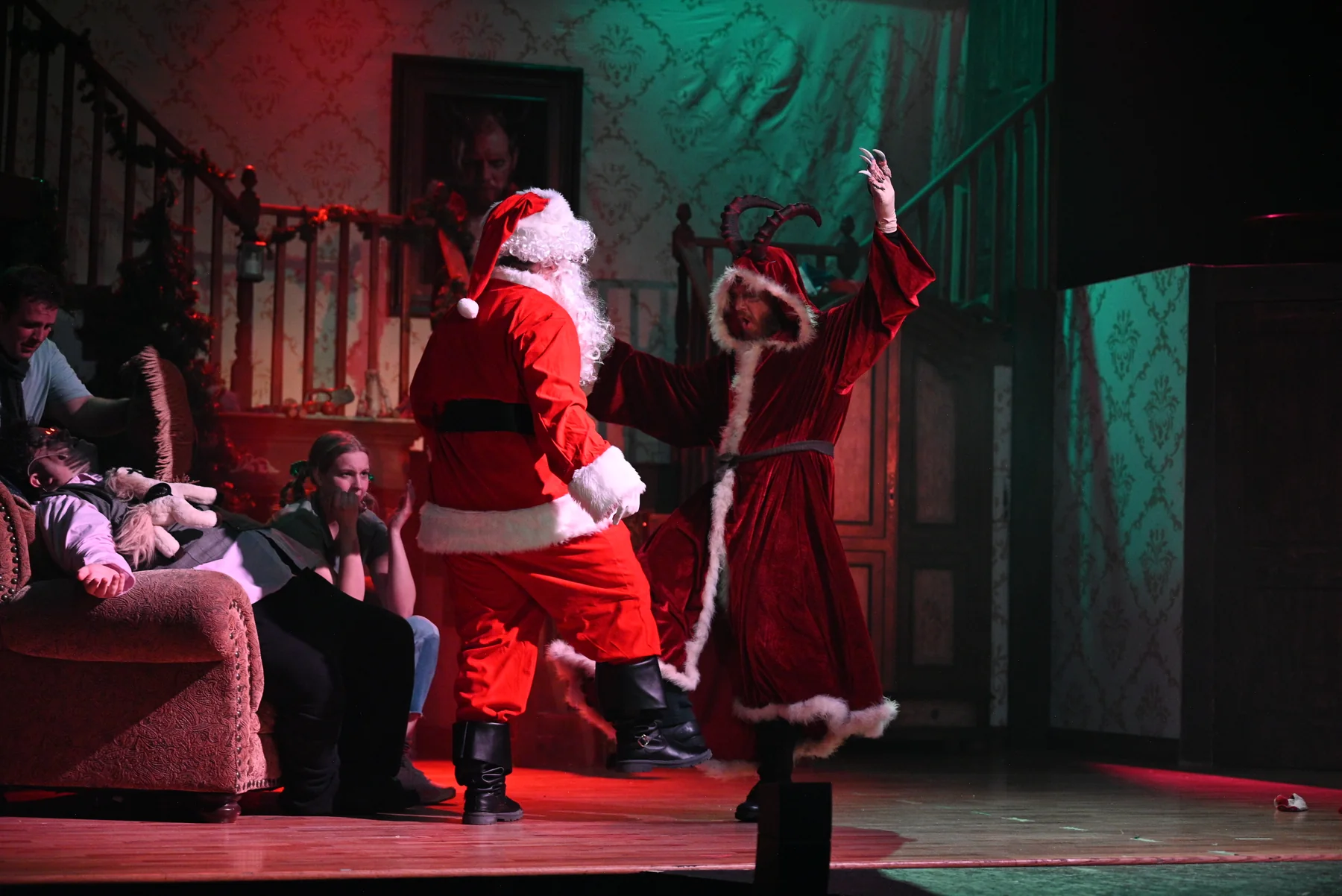 Santa and Krampus share a comic dance in the 2025 production.